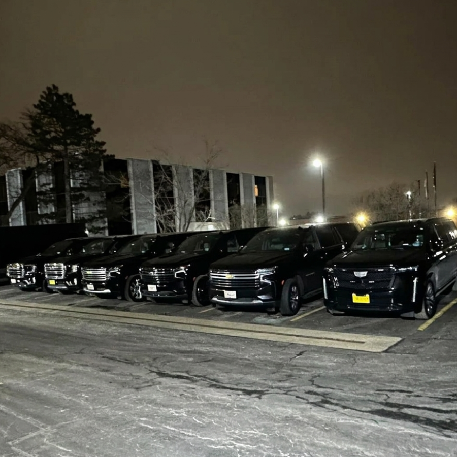 A Variety of Luxury SUV Limos parked in Chicago Downtown at an Event